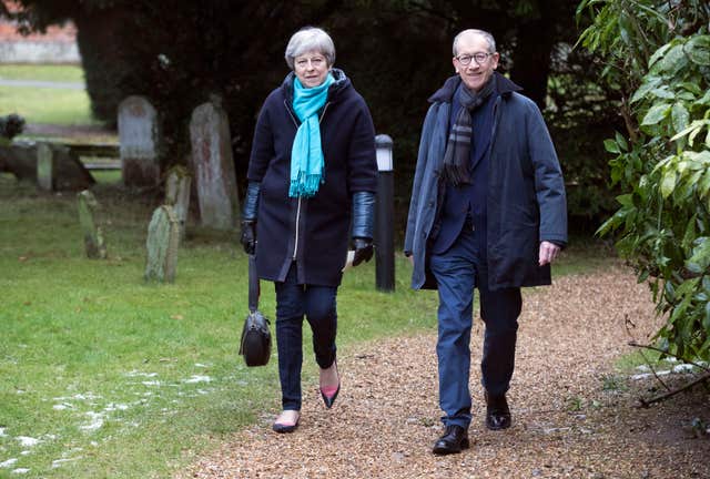Prime Minister Theresa May and her husband Philip leave after attending a church service near her Maidenhead constituency (Steve Parsons/PA)