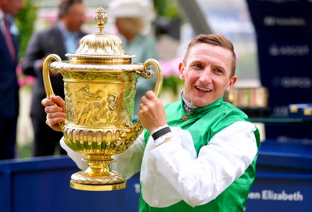 Patrick Joseph 'PJ' McDonald celebrates with the King George VI And Queen Elizabeth Stakes trophy