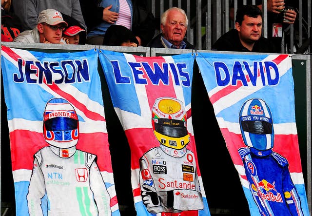 Formula One fans show their support for British drivers Jenson Button, Lewis Hamilton and David Coulthard in 2008