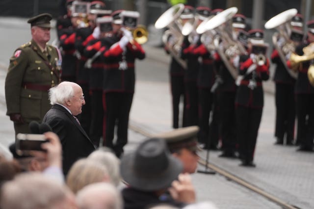 Irish President Michael D Higgins stands during a ceremony to mark the anniversary of the 1916 Easter Rising at the GPO on O’Connell Street Dublin