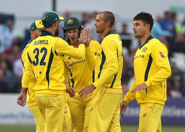 Australia’s Ashton Agar (2nd right) celebrates one of his three wickets