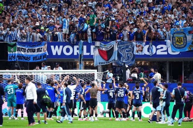 Argentina players celebrate with their fans