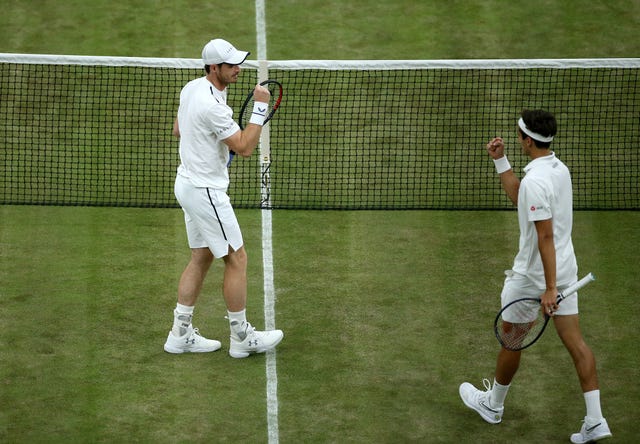 Pierre-Hugues Herbert and Andy Murray celebrate winning the match 