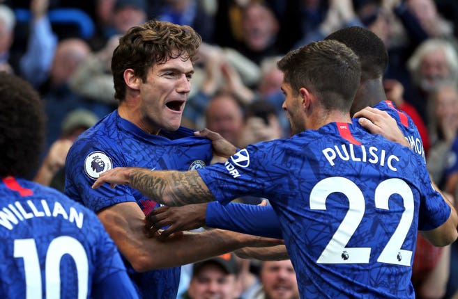 Marcos Alonso (left) celebrates with Christian Pulisic