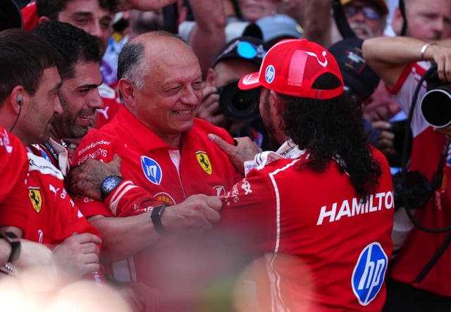Lewis Hamilton celebrates with Fred Vasseur