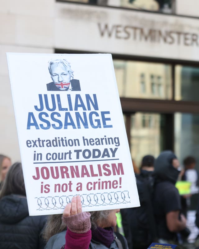 Supporters of Wikileaks founder Julian Assange protest outside Westminster Magistrates’ Court 