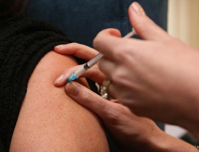 Immunisation has increased, although the uptake of measles jabs has fallen behind (Niall Carson/PA)