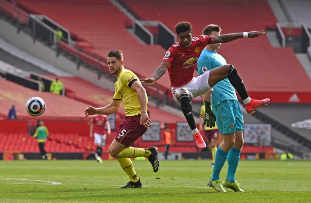 Marcus Rashford battles for the ball