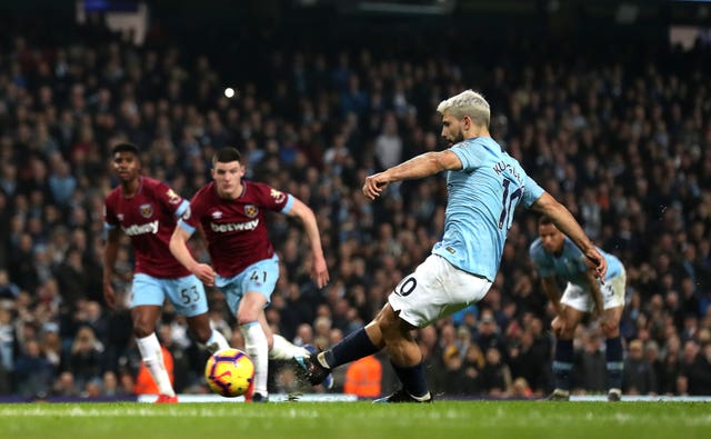 Sergio Aguero slots in from the penalty spot