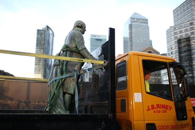 The statue is removed at West India Quay