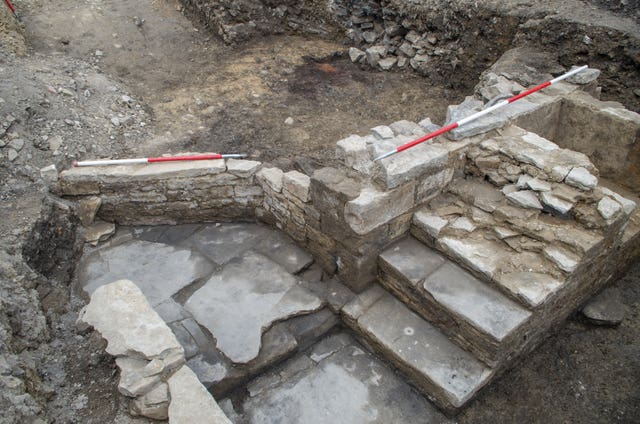 The excavated walls and staircase at the castle