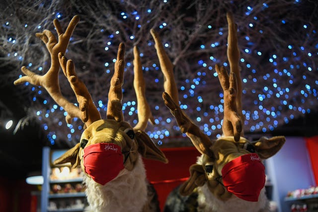 Toy reindeers wearing masks on display during the Hamleys Christmas toy showcase at Hamleys, Regent Street, London