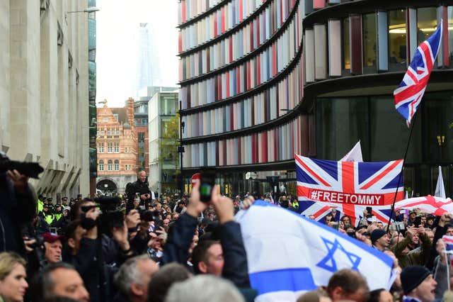 Crowds wait for the arrival of Tommy Robinson outside the Old Bailey