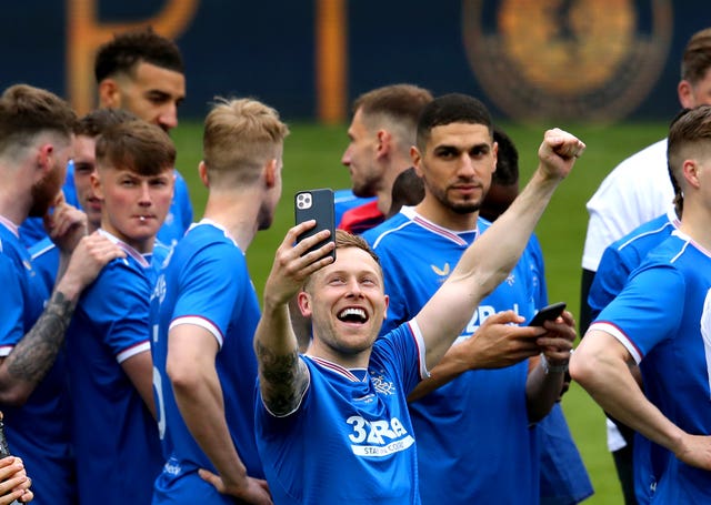Scott Arfield celebrates Rangers' title triumph