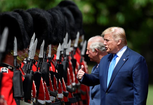 US President Donald Trump and the Prince of Wales inspect the guard of honour during a Ceremonial Welcome at Buckingham Palace