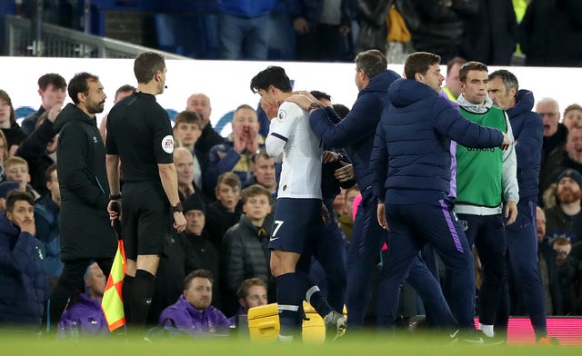 Son Heung-min is sent off for a challenge on Everton's Andre Gomes 
