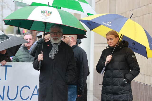 Former Sinn Fein president Gerry Adams and Sinn Fein’s Aisling Reilly outside court 