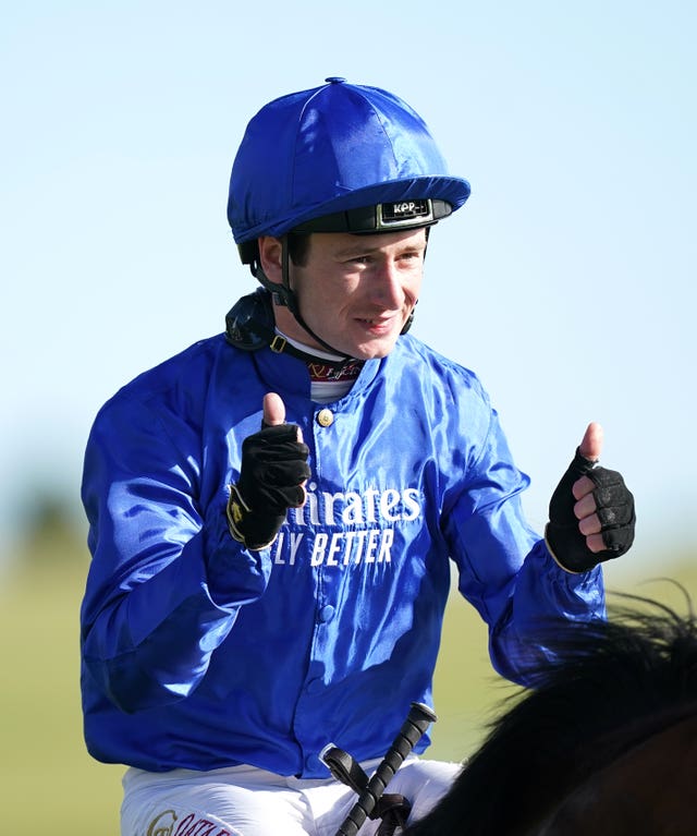 Oisin Murphy celebrates after Benbatl's win