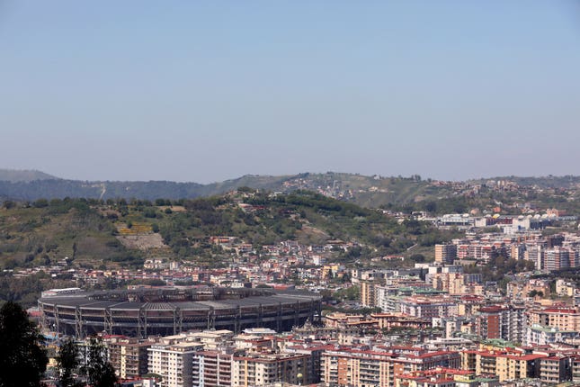 A Liverpool fan was taken to hospital after collapsing at half-time of the Champions League group match in the Stadio San Paolo