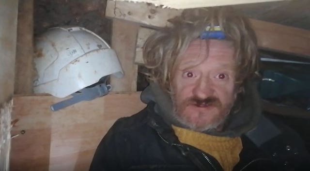 A protester known as Digger Down in part of a 100ft tunnel network dug in secret under Euston Square Gardens in central London, which they claim is at risk from the HS2 line development