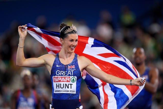 Amy Hunt celebrates after winning her fourth gold medal