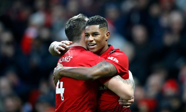 Marcus Rashford (right) celebrates his goal with Phil Jones