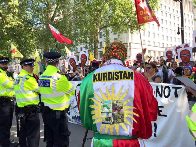Protests on Whitehall in central London (David Hughes/PA)