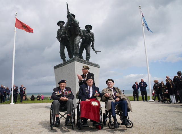 D-Day veterans Richard Brock with (front row left to right) Ken Hay, Henry Rice and Ken Benbow after a ceremony at the British Normandy Memorial in Ver-sur-Mer, France, to mark the 82nd anniversary of the D-Day landings
