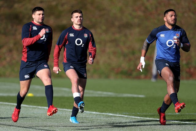 England’s Henry Slade, centre, and Manu Tuilagi have a strong bond on and off the pitch 
