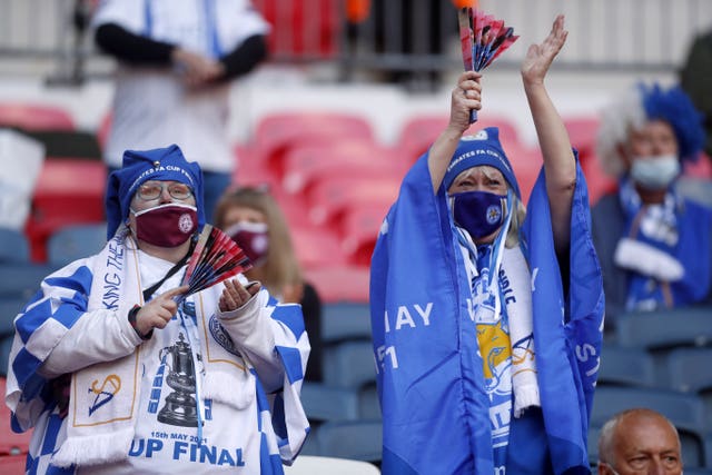 Leicester City fans wearing face coverings