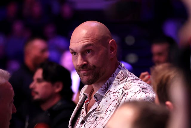Tyson Fury looks on