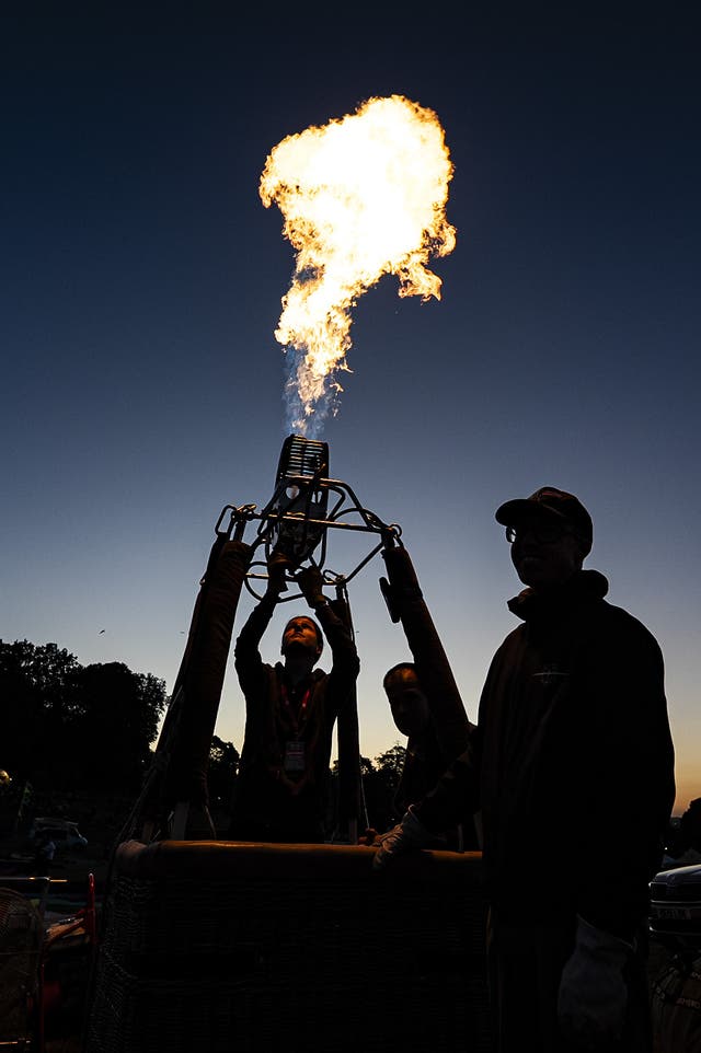 Pilots preparing the hot air balloon burners