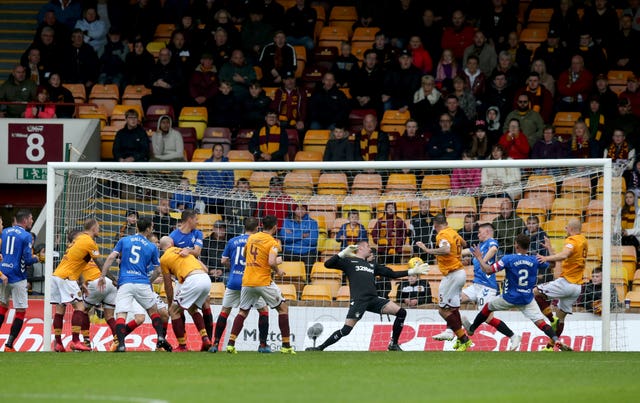 Peter Hartley scores Motherwell's last-gasp equaliser against Rangers