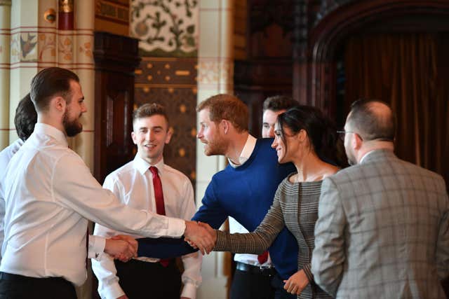 Prince Harry and Meghan Markle meet Only Boys Aloud (Ben Birchall/PA)