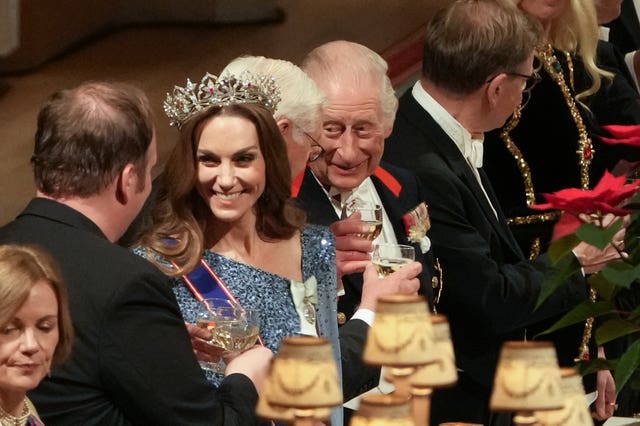 The Princess of Wales and the King at the state banquet table in Windsor Castle in December