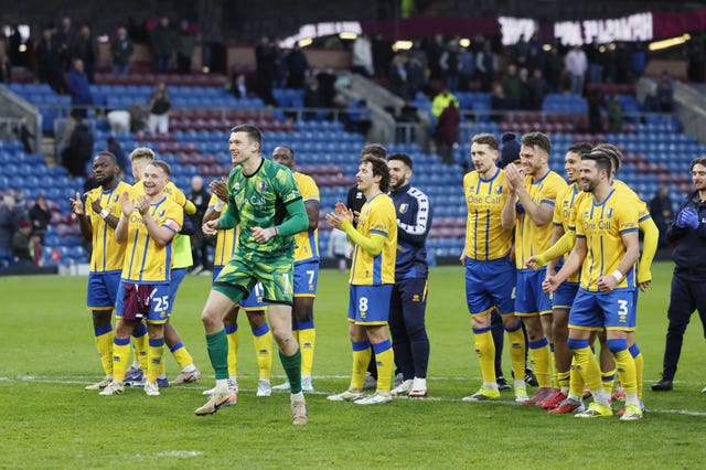 Mansfield's players celebrate their win
