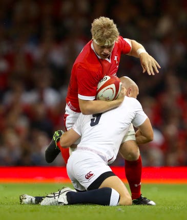 Wales’s Aaron Wainwright (left) and England’s Willi Heinz