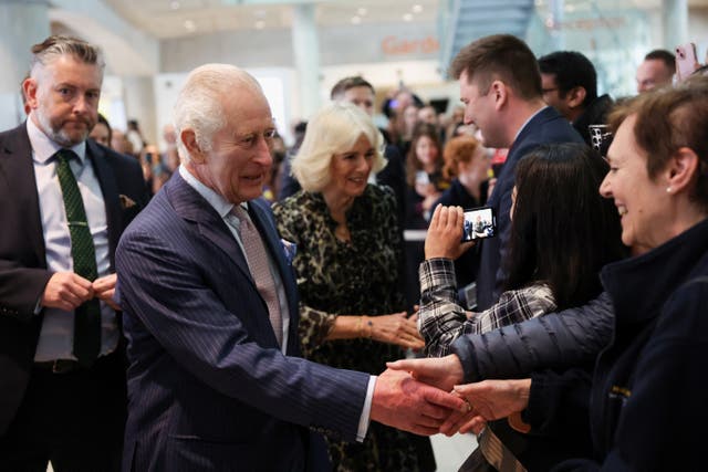 Charles and Camilla  meet staff members 