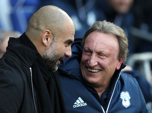 Neil Warnock, right, says Pep Guardiola should expect his Manchester City side to come up against a physical challenge