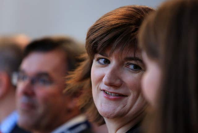 Nicky Morgan sitting in crowd