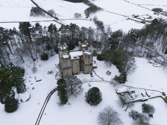 Snow surrounds the Langley Castle Hotel in Langley, Hexham, Northumberland