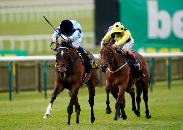 Cachet (left) stayed on well to land the Nell Gwyn