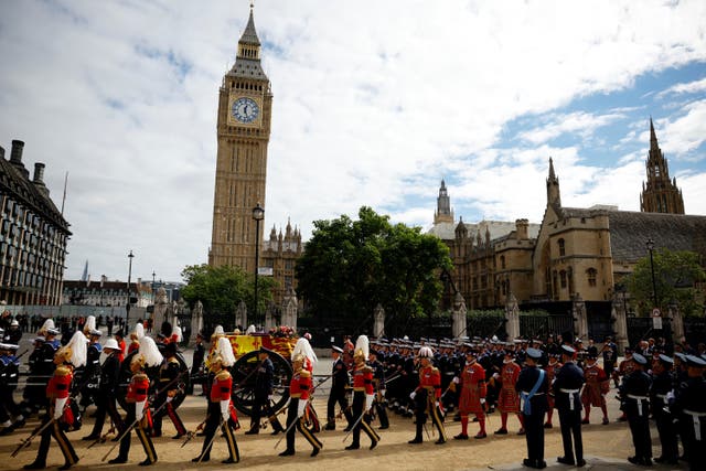 The Queen's coffin as it leaves Westminster Abbey
