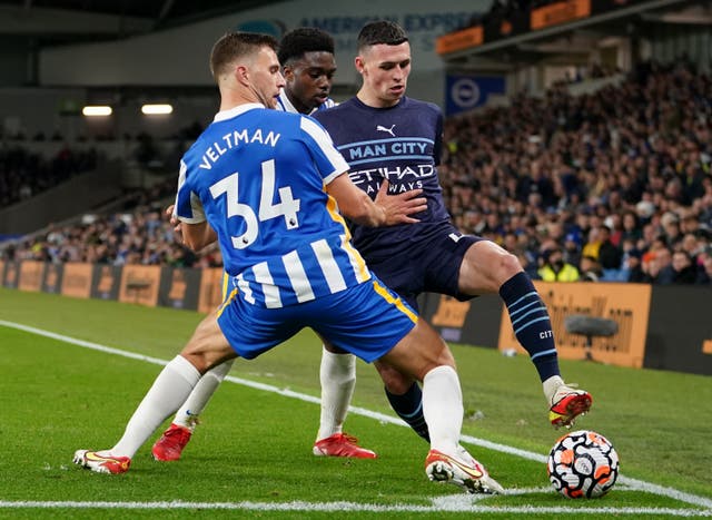 Phil Foden (right) shone in Manchester City's 4-1 win at Brighton (Gareth Fuller/PA).