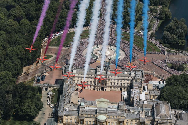 The Red Arrows carrying out a flypast over Buckingham Palace