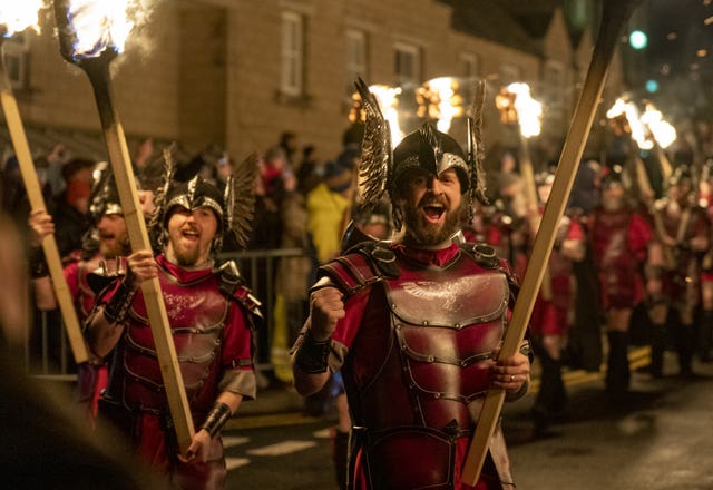 The Jarl Squard take part in the torch procession