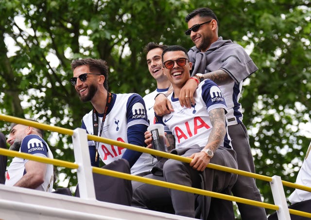 Cristian Romero and Tottenham team-mates celebrate winning the Europa League