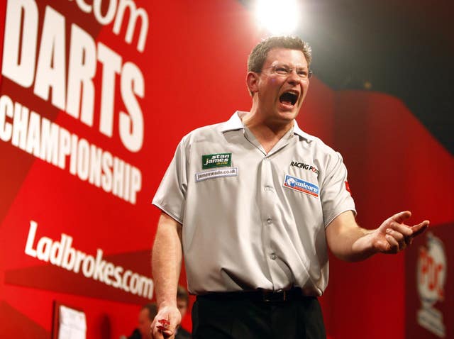 James Wade celebrates on stage