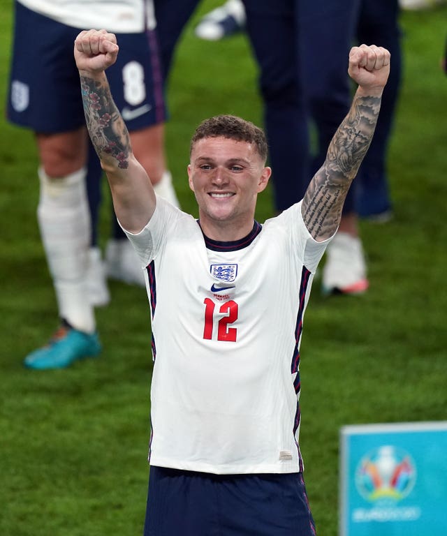 England's Kieran Trippier raises both arms in celebration