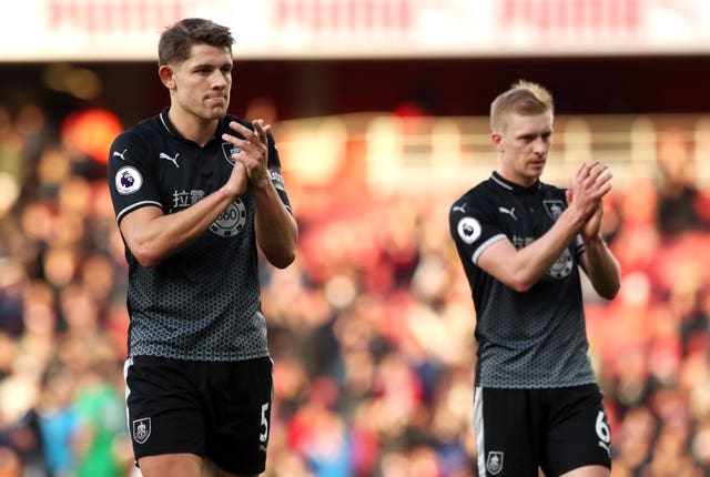 Tarkowski, left, and Ben Mee have formed a successful defensive partnership at Burnley (Jonathan Brady/PA)